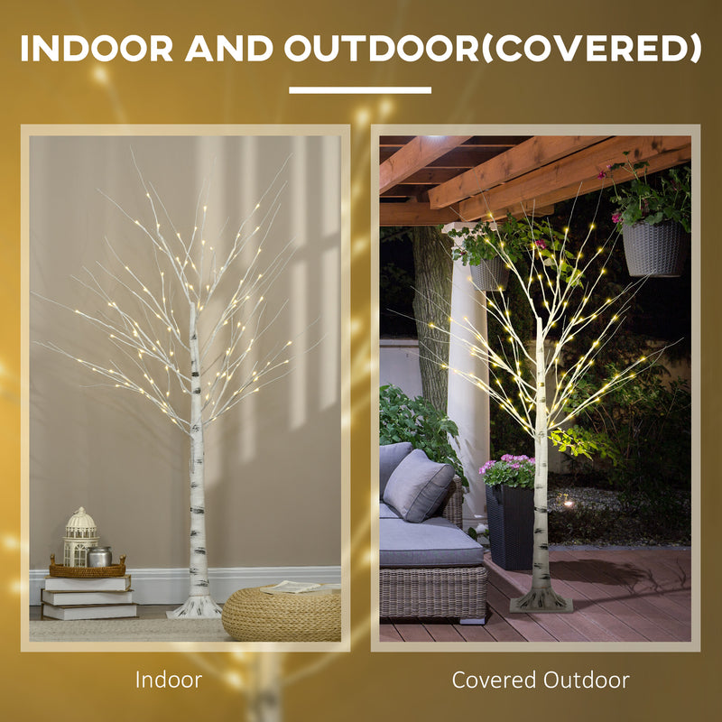 5ft Pre-Lit White Birch Tree shown indoors and in a covered outdoor area