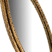 Close-up of the gold dimpled frame edge