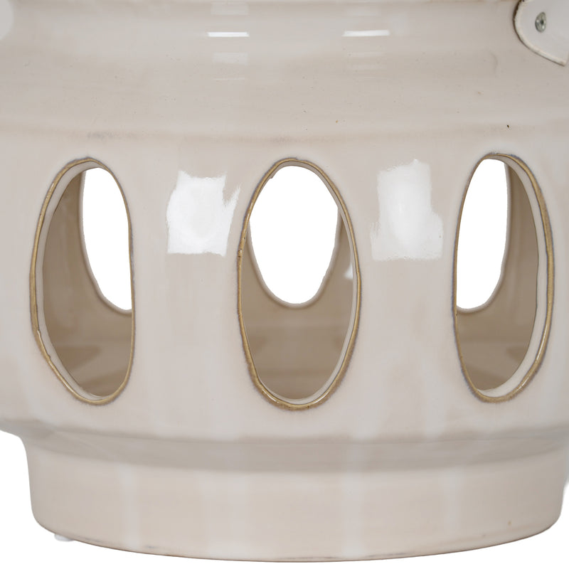 Close-up of the oval cut-outs in the cream glaze
