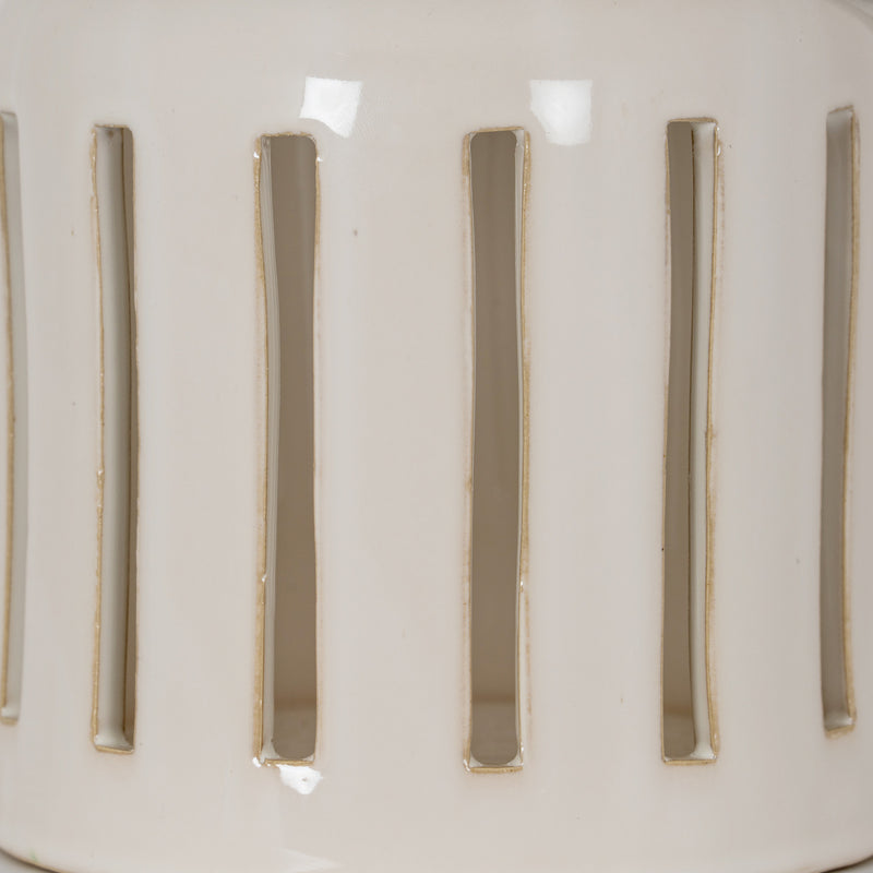Close-up of the window cut-outs in the white glaze
