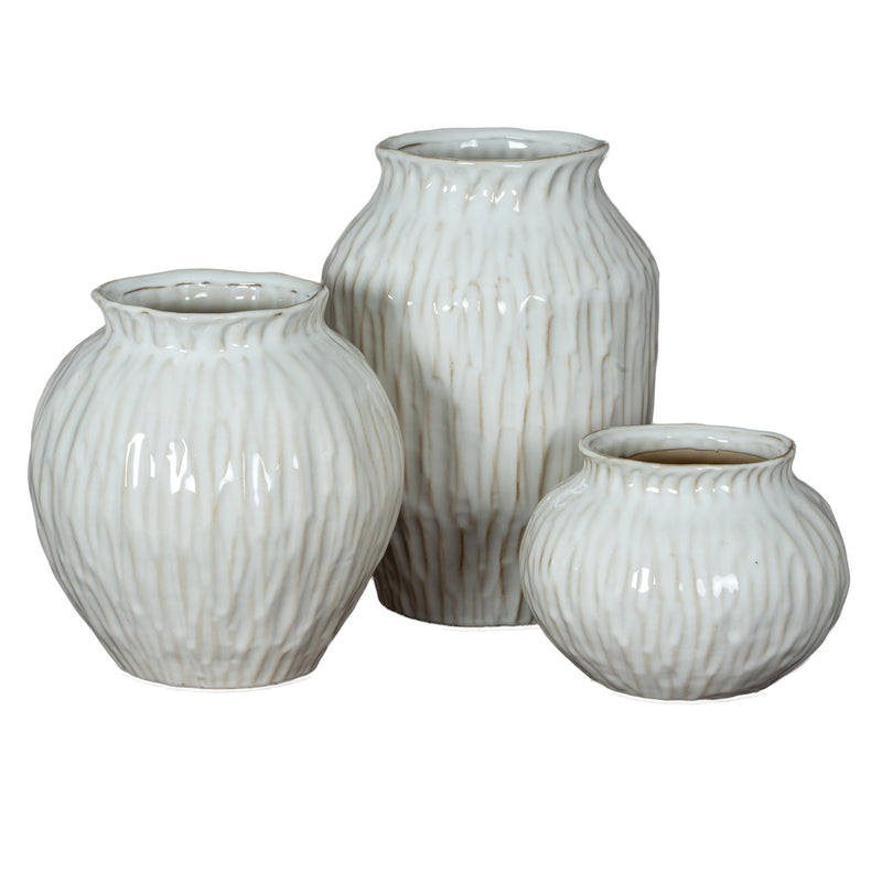 Numa vase shown with two other Numa vases, sold separately
