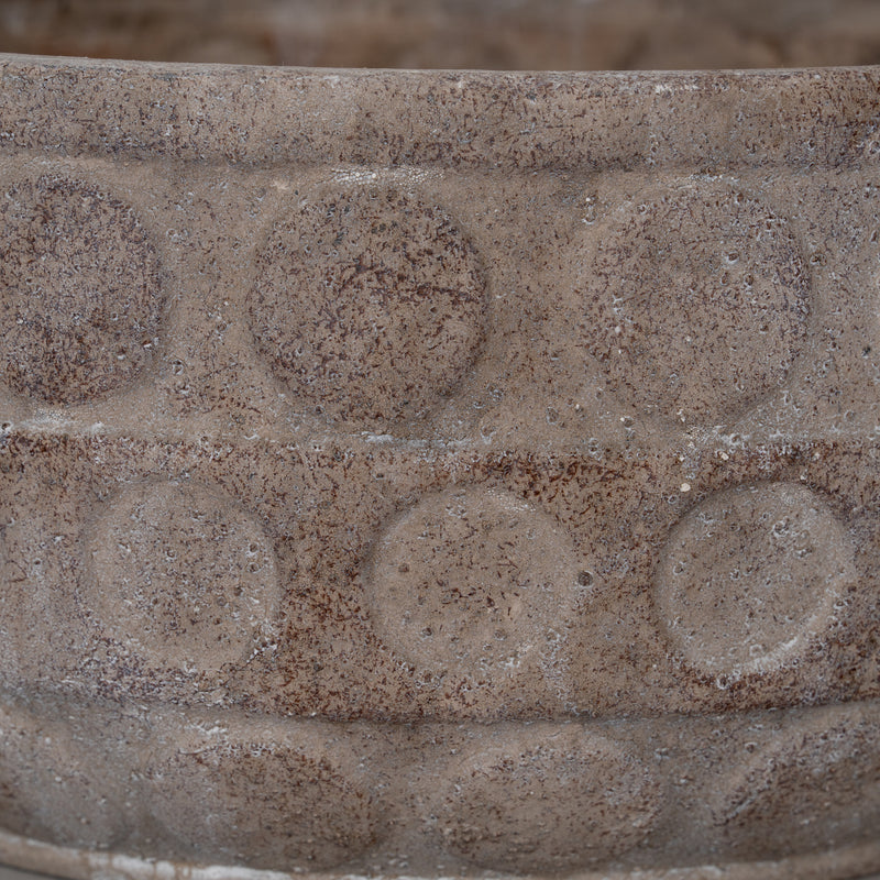 Close-up of the raised circle pattern and stone texture