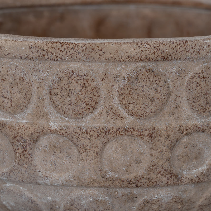 Close-up of the raised circle pattern and stone texture