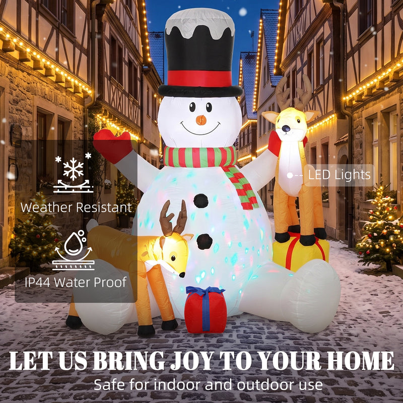 Illuminated 7ft snowman and reindeer Christmas inflatable at night