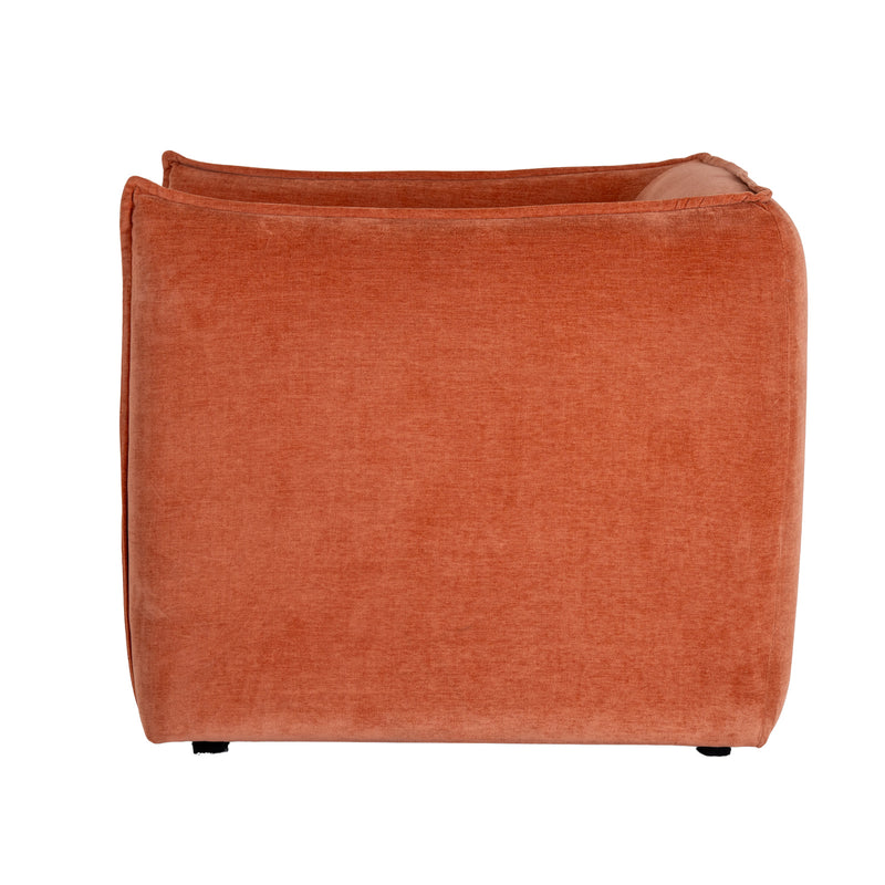 side view of the burnt orange armchair