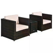 Two brown rattan armchairs with cushions and a glass-top coffee table