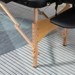 Black folding wooden massage table – image 8