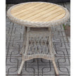 Provence bistro table standing on patterned outdoor tiles
