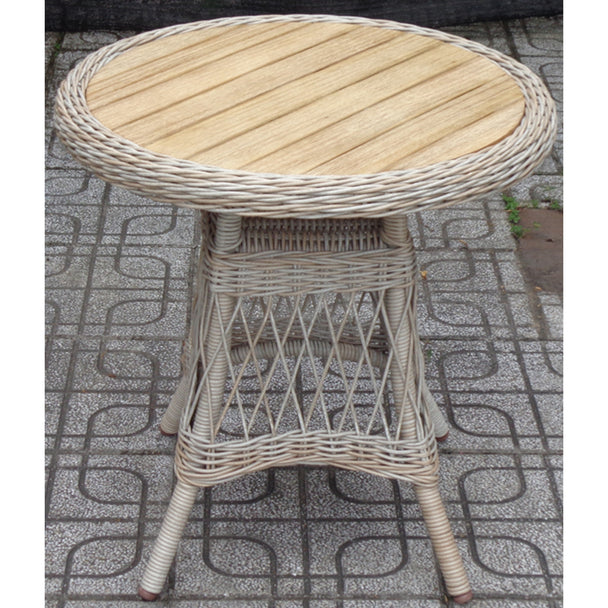 Provence bistro table standing on patterned outdoor tiles
