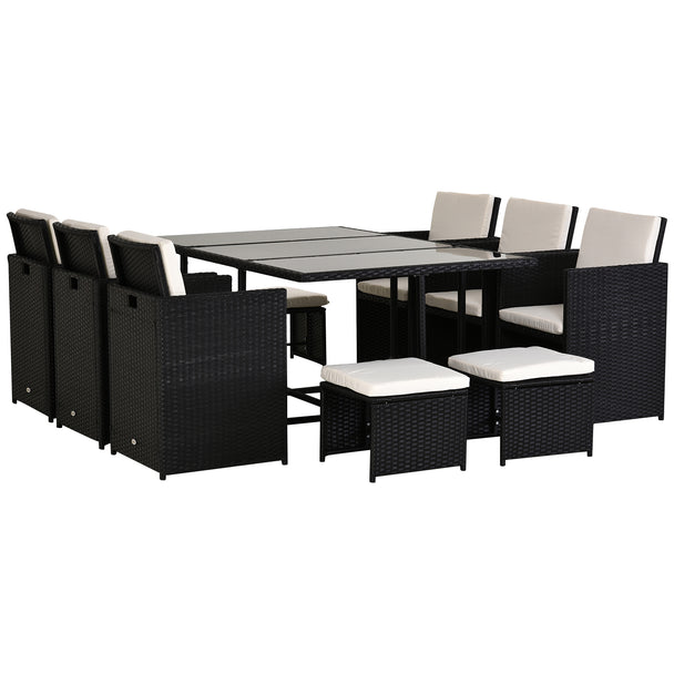 Black rattan 11-piece cube dining set with glass-top table, six chairs and four footstools with white cushions