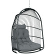 Dark grey foldable PE rattan hanging egg chair with tufted cushion and headrest, hung from a ceiling chain