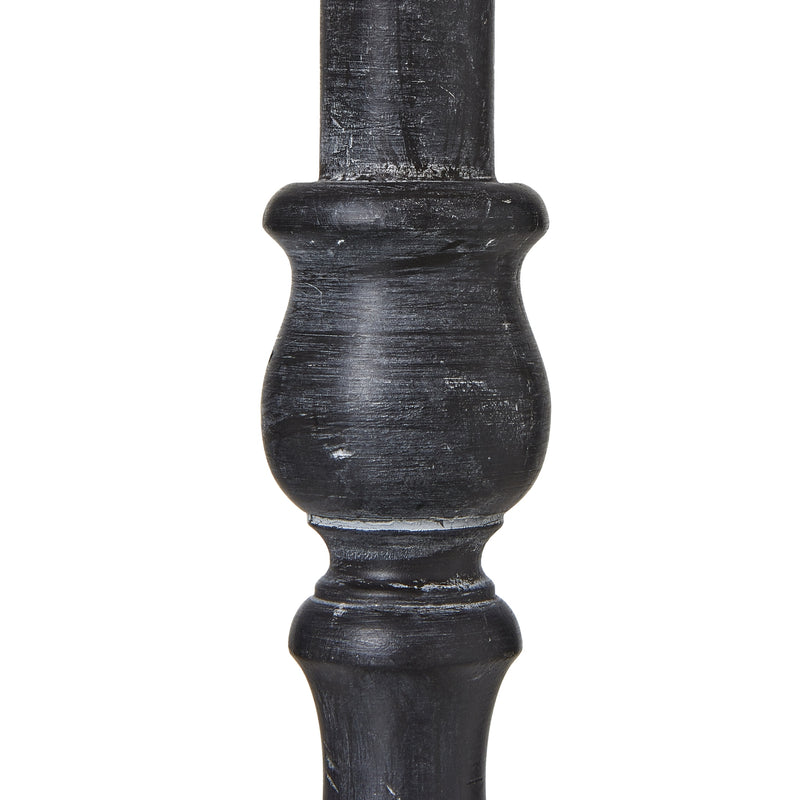 Close-up of the turned black column
