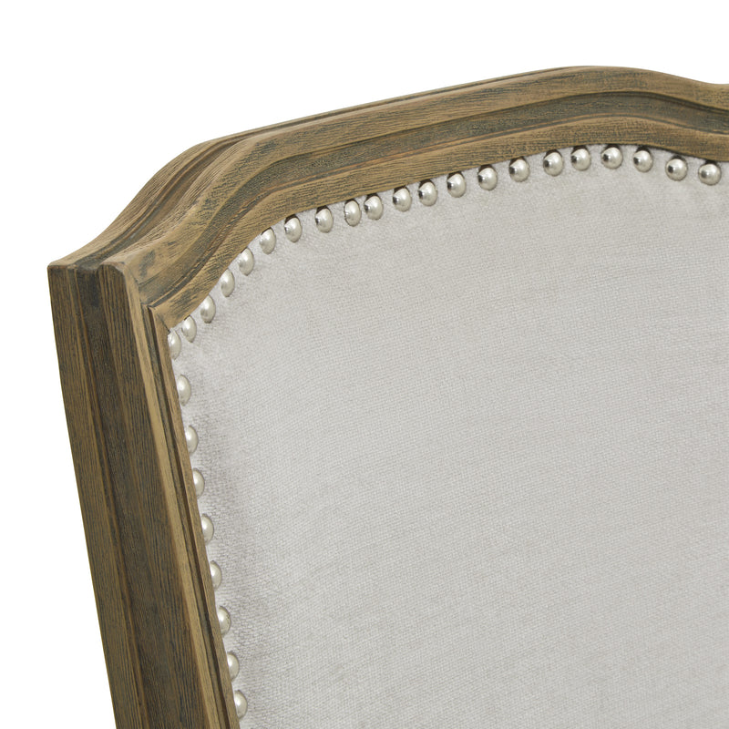 Close-up of the carved frame and stud trim on the back
