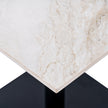Close-up of the white veined stone-finish top corner