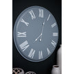 Rothay grey clock on a dark wall with vases