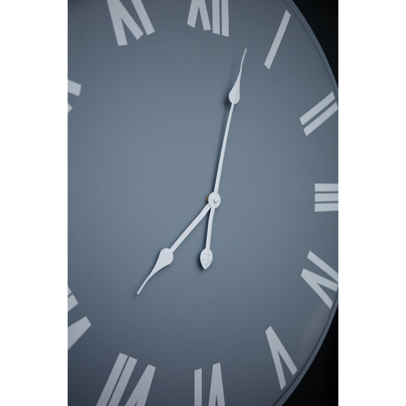 Rothay grey clock seen from an angle on a dark background