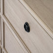 close-up of a black ring knob