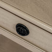 close-up of the black round drawer handle
