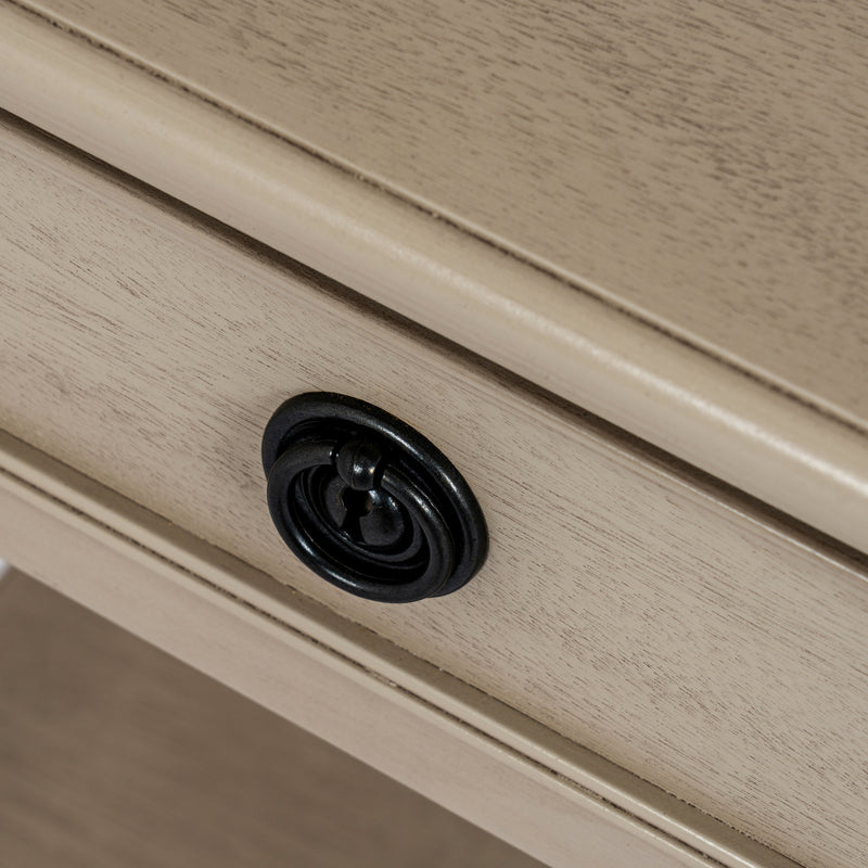 close-up of the black round drawer handle