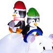 6.4ft Polar Bear and Penguins Christmas Inflatable illuminated outside a home
