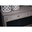 Close-up of the grey console table drawer and lower shelf
