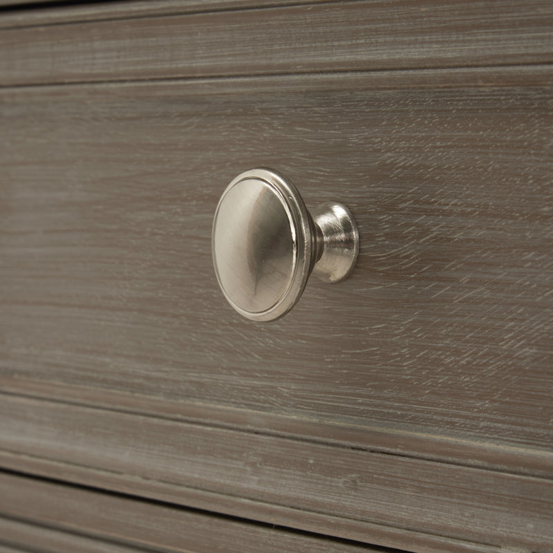 close-up of the round metal drawer knob