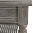 Close-up of the rattan shelf and leg