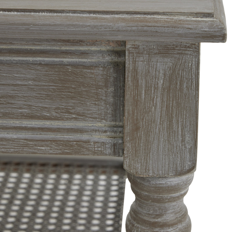 Close-up of the rattan shelf and leg