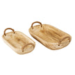 Two carved wooden trays side by side