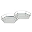 Two silver hexagon mirrored trays on a white background