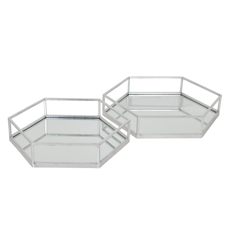 Two silver hexagon mirrored trays on a white background