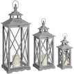 Set of 3 grey-washed wooden lanterns with LED candles inside