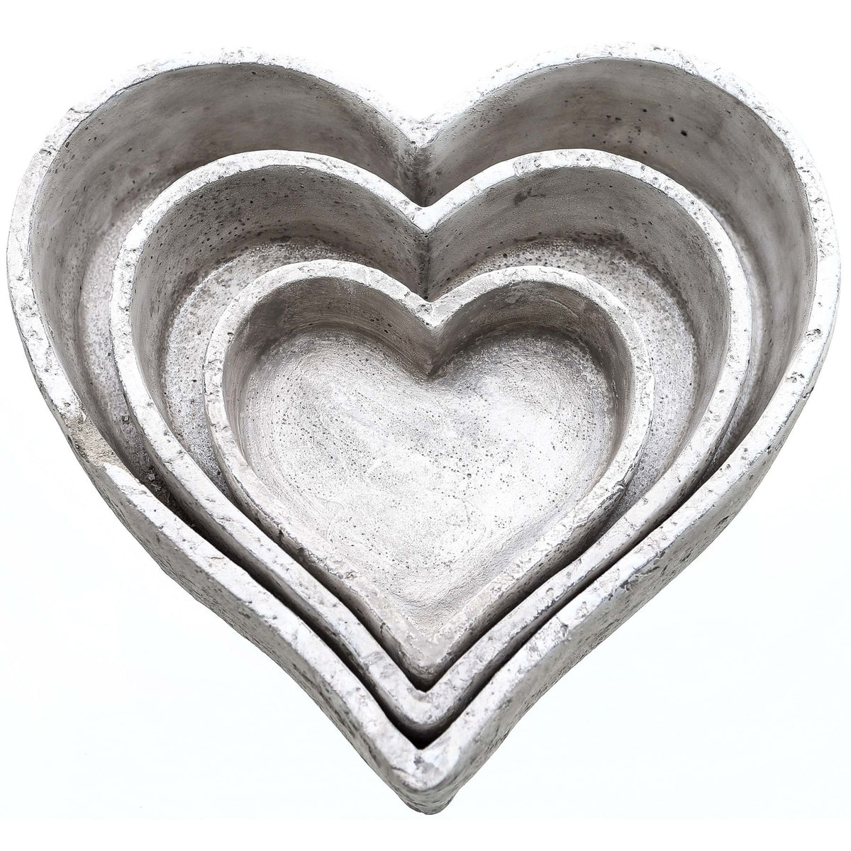 Set of three stone-effect ceramic heart dishes nested together