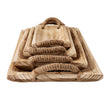 Four stacked wooden trays from the end