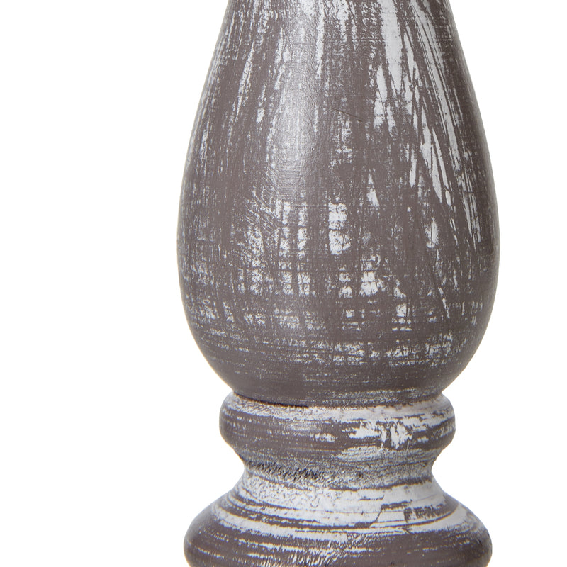 Close-up of the weathered grey-washed column