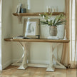 Siena amphora pot with faux flowers on a console table