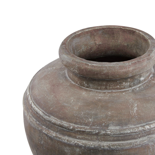 Close-up of the large water pot's wide mouth
