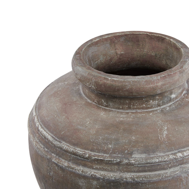 Close-up of the large water pot's wide mouth
