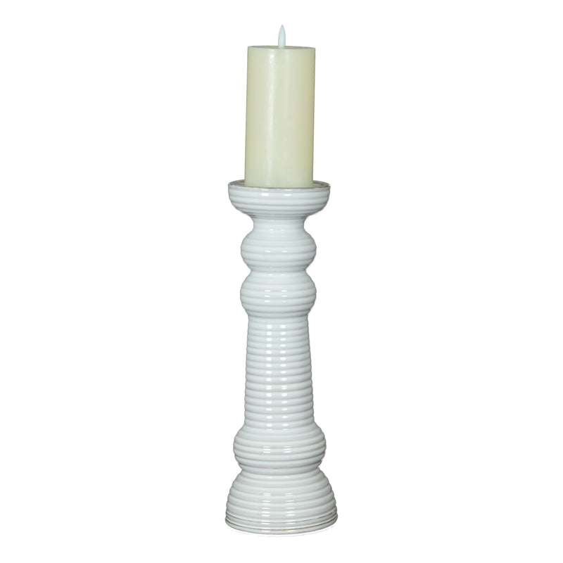 Sile large candle holder with a cream pillar candle
