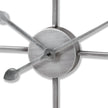 Close-up of the hands and brushed silver centre