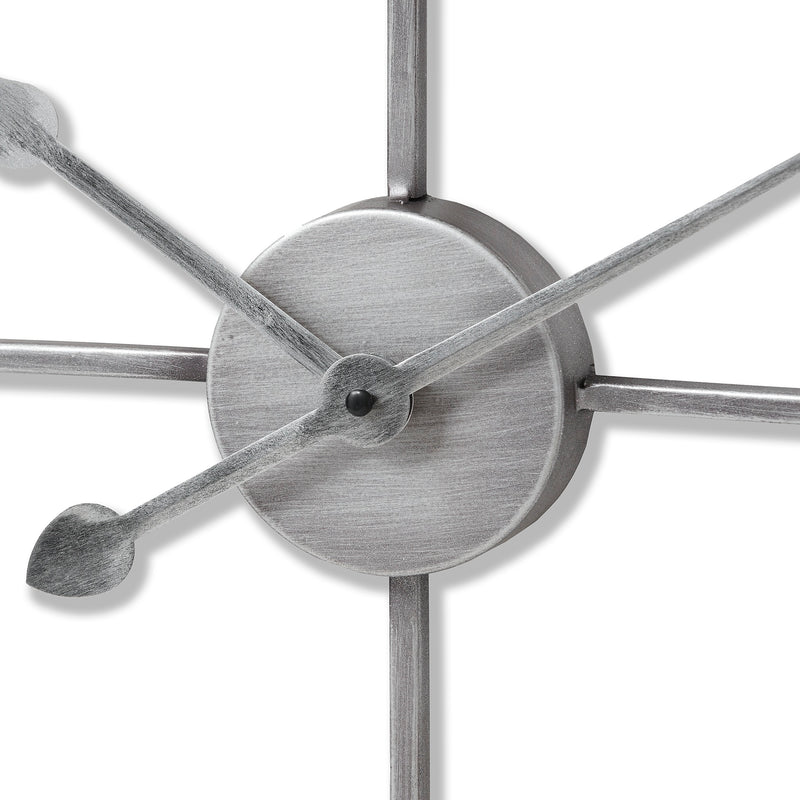 Close-up of the hands and brushed silver centre