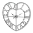 Silver heart-shaped skeleton wall clock, front view
