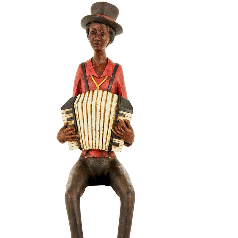 Close-up of the accordion player figurine