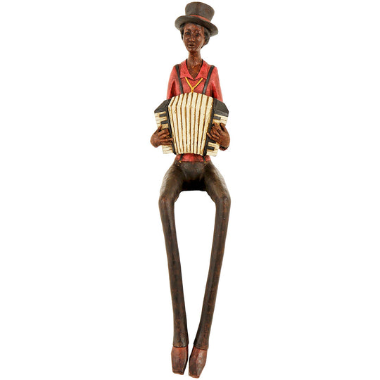 Sitting jazz accordion player figurine in a red shirt on white