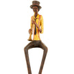 Close-up of the trumpeter figurine