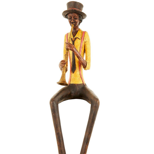 Close-up of the trumpeter figurine