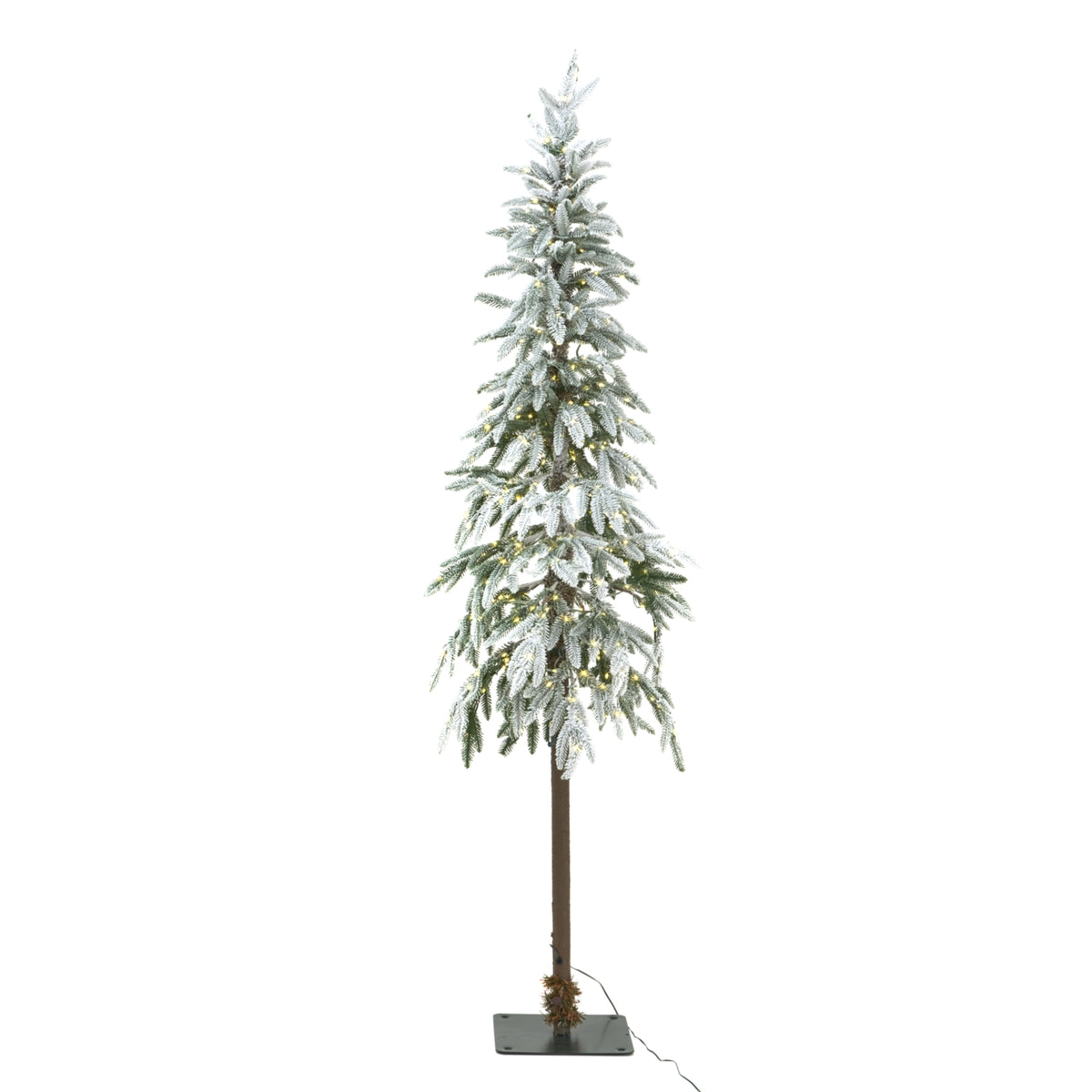 slim snowy woodland Christmas tree with lights on