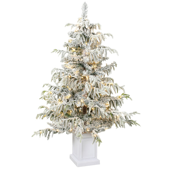 4ft snow-flocked pre-lit spruce Christmas tree in a glowing white pot