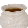 Wavy rim of the cream vase seen from above