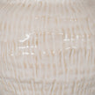 Close-up of the rippled cream glaze texture